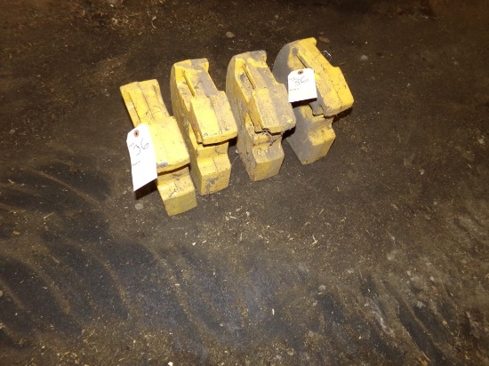 (4) New Holland Skid Steer Weights