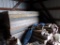 Large Group of Wooden Concrete Forms Just Inside Main Door of Barn