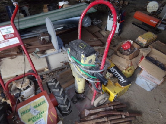 Bosch Electric Jackhammer on Red 2 Wheeled Dolly with 4 Bits