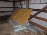 Insulation Board and Plywood Against Wall in Right Rear Corner