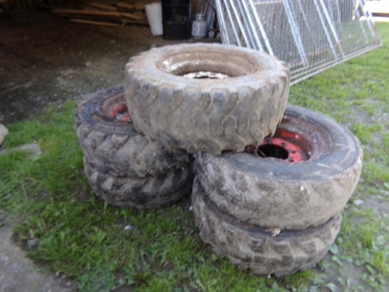 (5) Well Used Skid Steer Tires on Bobcat Wheels