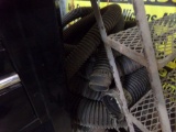 Group of Exhaust Evac Hoses Under Warehouse Steps