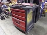 Black Rubbermaid Action Packer Plastic Tool Box and a Plastic Wall Shelf