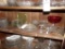 Contents Of 3rd Shelf Down - Mostly Clear Glass w/ (1) Lg. Red Glass Stemme
