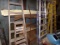 Pipe Shelf With Misc 2 X 4's, Lumber, Window, Etc. (Back Corner Behind Ladd
