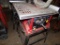 10'' Skilsaw Table Saw on Stand, With Guard, Protractor and Fence, Red, Wor