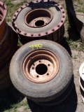 Set of (4) 5 Lug Skid Steer Wheels, (2) Have Track Drives Bolted to Them, 2