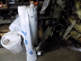 Large Roll of Plastic and Group of Metal Coat Hangers (Parts Room)