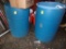 (2) Plastice Garbage Cans and a Blue Tub (Garage)
