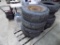 (4) Used 215/85 R16 Light Truck Tires and (1) Odd 16'' Spare on a Rusty Ste