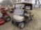 Gold EZ-Go RXV Electric Golf Cart with Canopy, Windshield, Bag Holder with