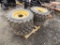 Set of (4) Heavy Duty Galaxy 12x16.5 Skid Steer Tires on Yellow 8 Lug Wheel