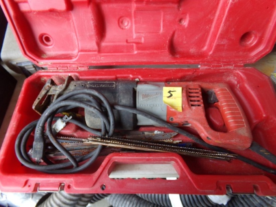 (1) Milwaukee Heavy Duty Sawzall and Used Blades in Box