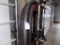 Group of (6) Lengths of Exhaust Hose Hanging on Strut Compressor
