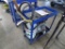 Transfer Pump on Blue 2 Tier Shop Cart Used for Loading Tractor Tires with