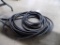 (2) Black Air Hoses Under the Table