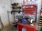 Ammco Brake Lathe with Tooling on the Wall Behind It