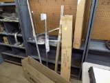 Group of New Trailer Parts: Door Bars Latches, Hub Covers, Air Shock Suppor