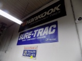 (3) Advertising Banners on Shop Wall by Show Room Door: Hankook, Sun-True a