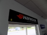 Hankook Driving Emotion Sign on Wall in Showroom