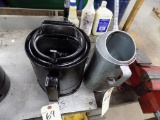 (2) Metal Oil Cans: (1) Black 5 Qt. and (1) Silver 3.8 Qt.