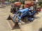 New Holland TZ220 4 WD Compact  Tractor with 10LA Loader, 48'' Bucket, Dies