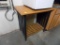 36'' x 23 1/2'' Oak Color and Black Table with Shelf Underneath (Back Room)