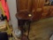 Small Round Accent Table and Group of Large Decorations