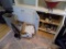Contents of Lower Cabinets in Corner of Living Room - Decorations, Vases, F