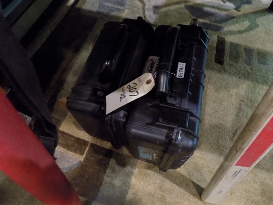 (2) Empty Black Surveyor Level Cases Under the Table (Sm. Den off Kitchen)