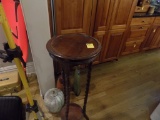 Small Round Accent Table and Group of Large Decorations