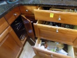 Contents of Lazy Susan and Drawers Near Double Oven - a Few Pots and Pans,