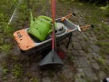 Worx 2-Wheeled Garden Cart, Watering Cans, (2) Rakes  (Outside - Pool Area)