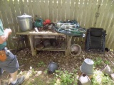Contents On and Around Table by Privacy Fence - Bird Feeders, Planters, Buc