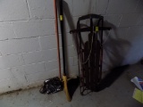 Runner Sled, (2) Brooms  (North Side of Basement)