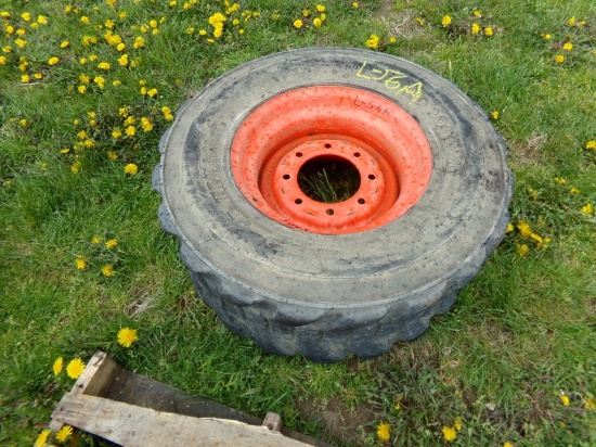 (1) Titan Heavy Duty 2000 II 12-16.5 Tire on 8 Lug Kubota Wheel (5009)
