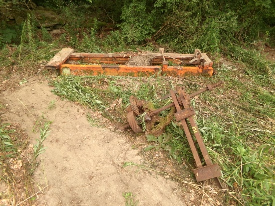 Orange Fork Lift Mast. And An Antique Geared Machinery Chuck (Across Road)