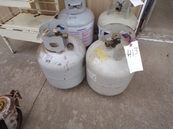(2) 20 LB Propane Tanks (Outside Out Front)