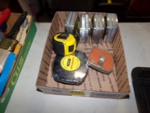 Box of Tape Measures and a 100 Ft. Steel Tape