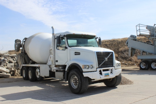 2004 Volvo VHD Truck w/McNeilus 11 cubic yd. Cement Mixer.