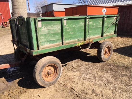 John Deere wood barge box w/hoist on Minneapolis Moline gear (rusty, used for fertilizer).