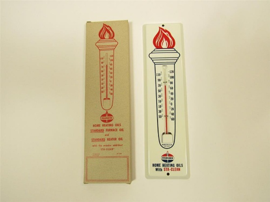 NOS 1950s Standard Heating Oil tin thermometer still in the original box.