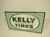 Sharp 1967 NOS Kelly Springfield Tires single-sided embossed tin automotive garage sign.