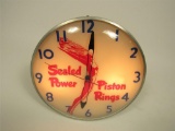 Stylish circa 1940s-50s Sealed Power Piston Rings glass-faced light-up service station clock