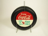 Extremely rare and desirable late 1950s-early 1960s Coca-Cola metal tire holder with period tire.