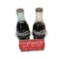 Extremely uncommon 1950s Enjoy Coca-Cola While You Shop bottle holder with two unopened Coca-Cola bo