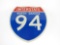 Circa 1970s North Dakota Interstate 94 die-cut metal shield-shaped highway road sign.