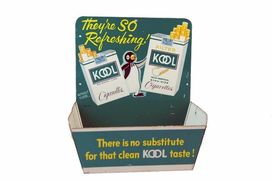 Vintage Kool Cigarettes metal countertop display with Penguin graphic.