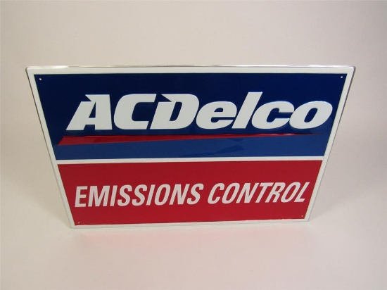 NOS AC Delco Emissions Control single-sided embossed tin automotive garage sign.