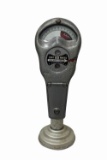 All-original vintage 1950s Municipal parking meter on countertop stand.